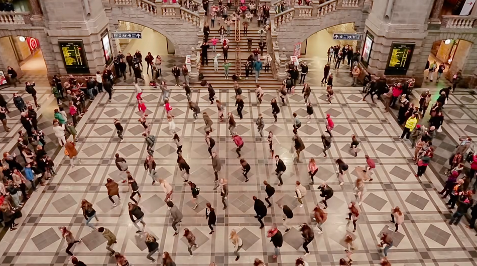 Dancers tip hats to the past in epic 250 person ‘Grease’ flash mob