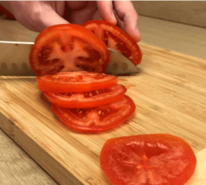 Thinly slice tomatoes for quirky take on an omelette