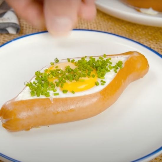 Slice a hot dog in the middle and add an egg plus 5 other breakfast