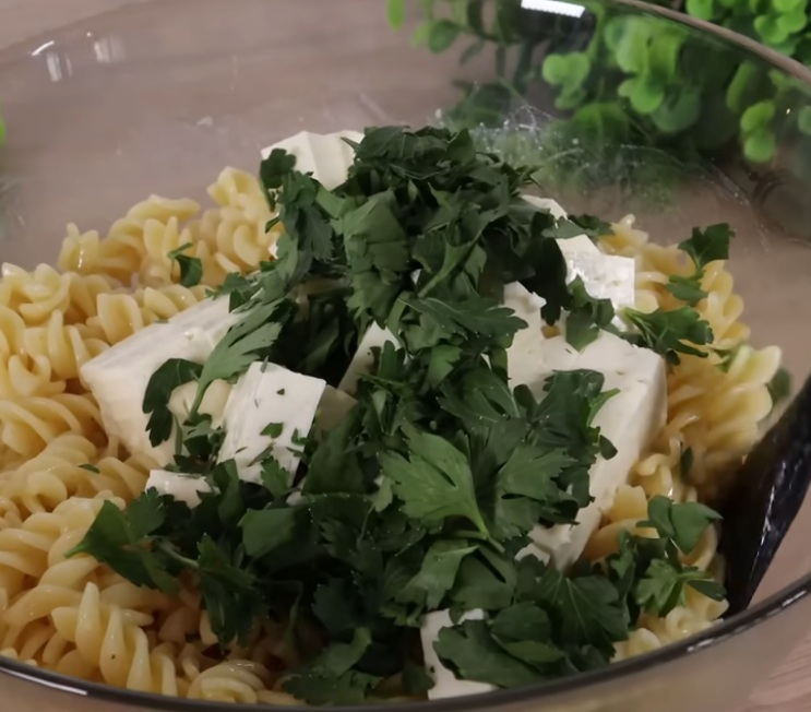 Fill bundt pan with pasta and fetta cheese then top with milk for