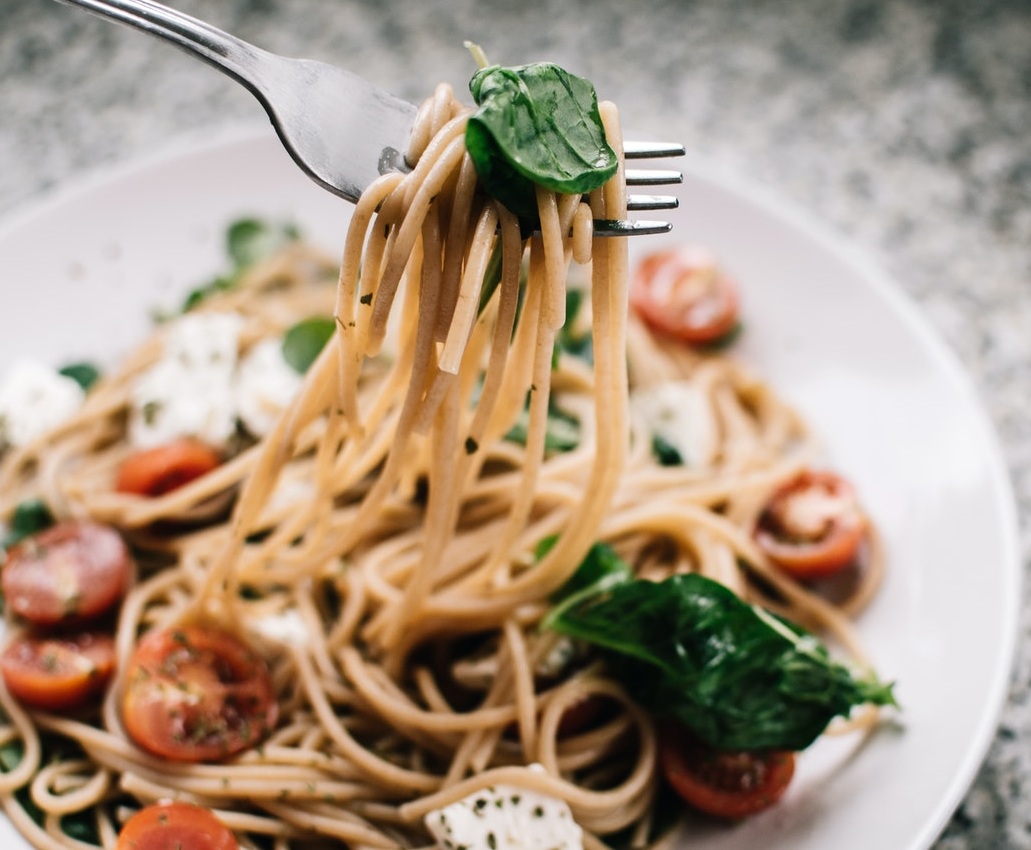 Fill bundt pan with pasta and fetta cheese then top with milk for