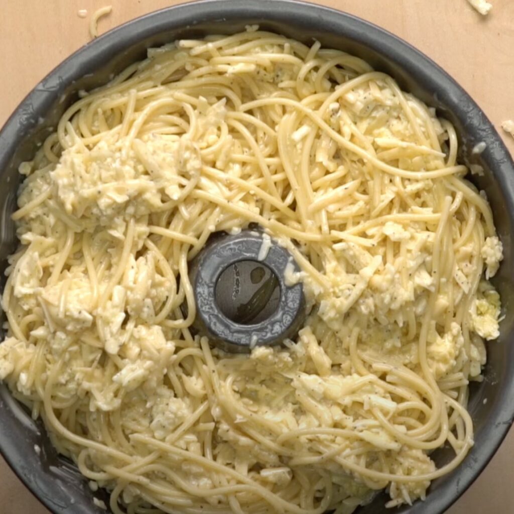 Toss noodles in a bundt pan then place it in the oven for a meal you’ll